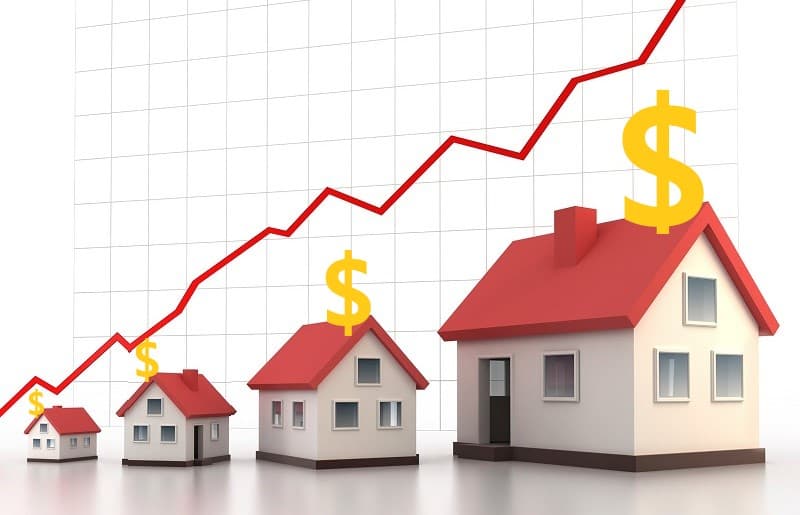 Graph with real estate house with an upwards trend of making money