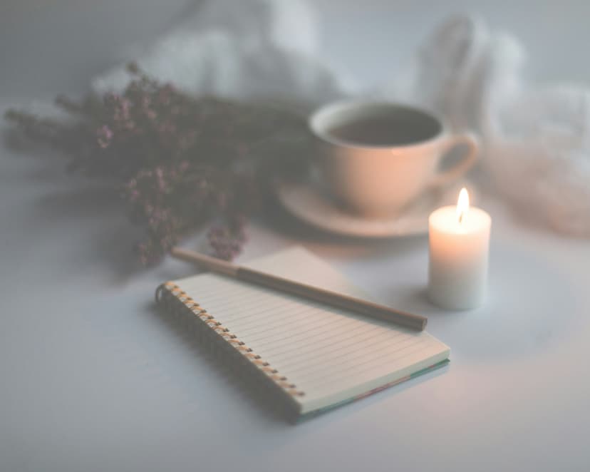 Journal, candle, tea